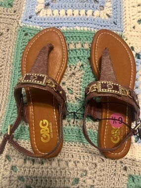 G by Guess Brown T-Strap Sandals with Gold Accents